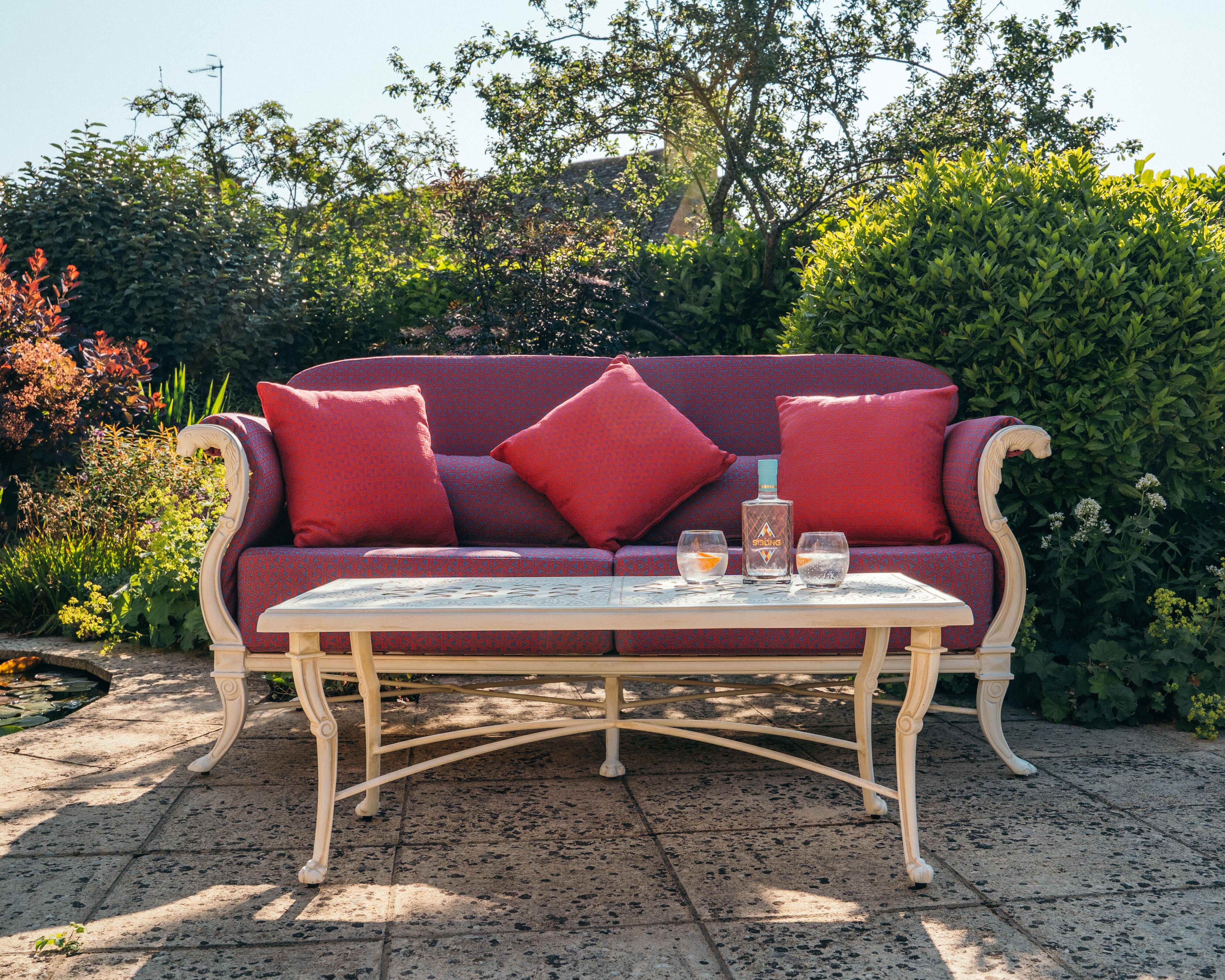 Luxor-double-sofa-pink-cushions-gin